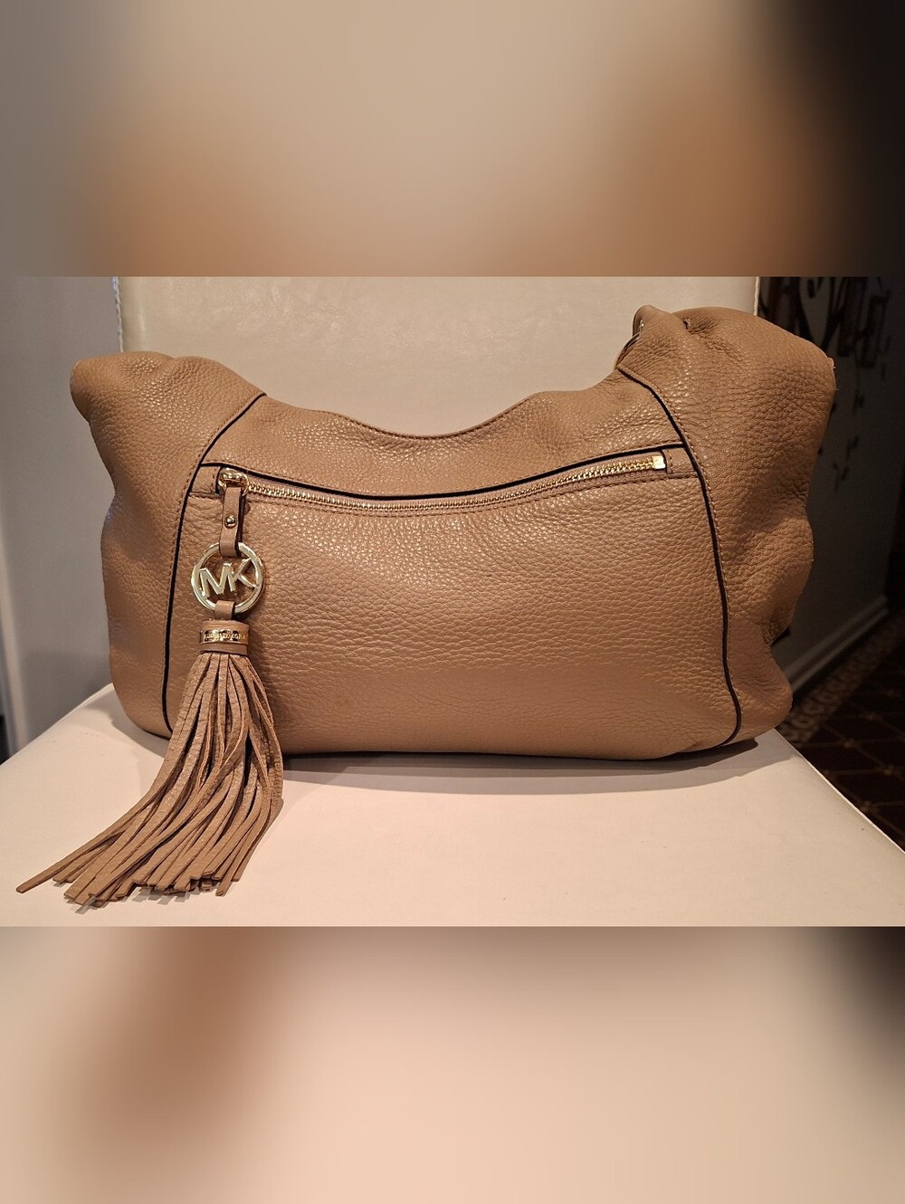Michael Kors Beige Pebbled Leather Hobo with Tassel Charm